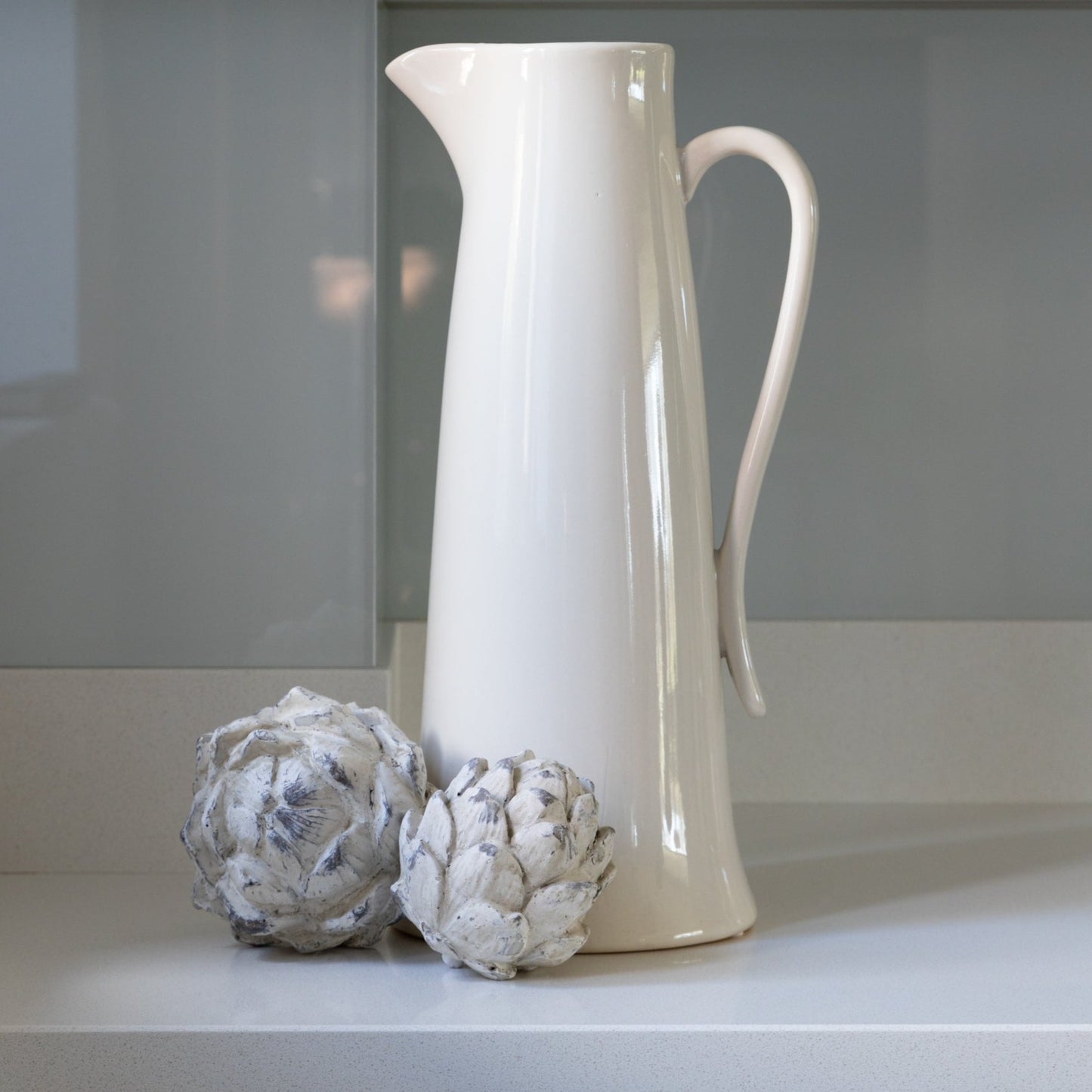 Handcrafted Ivory Ceramic Jug with elegant design, available at Clarkson Lee Lifestyle.
