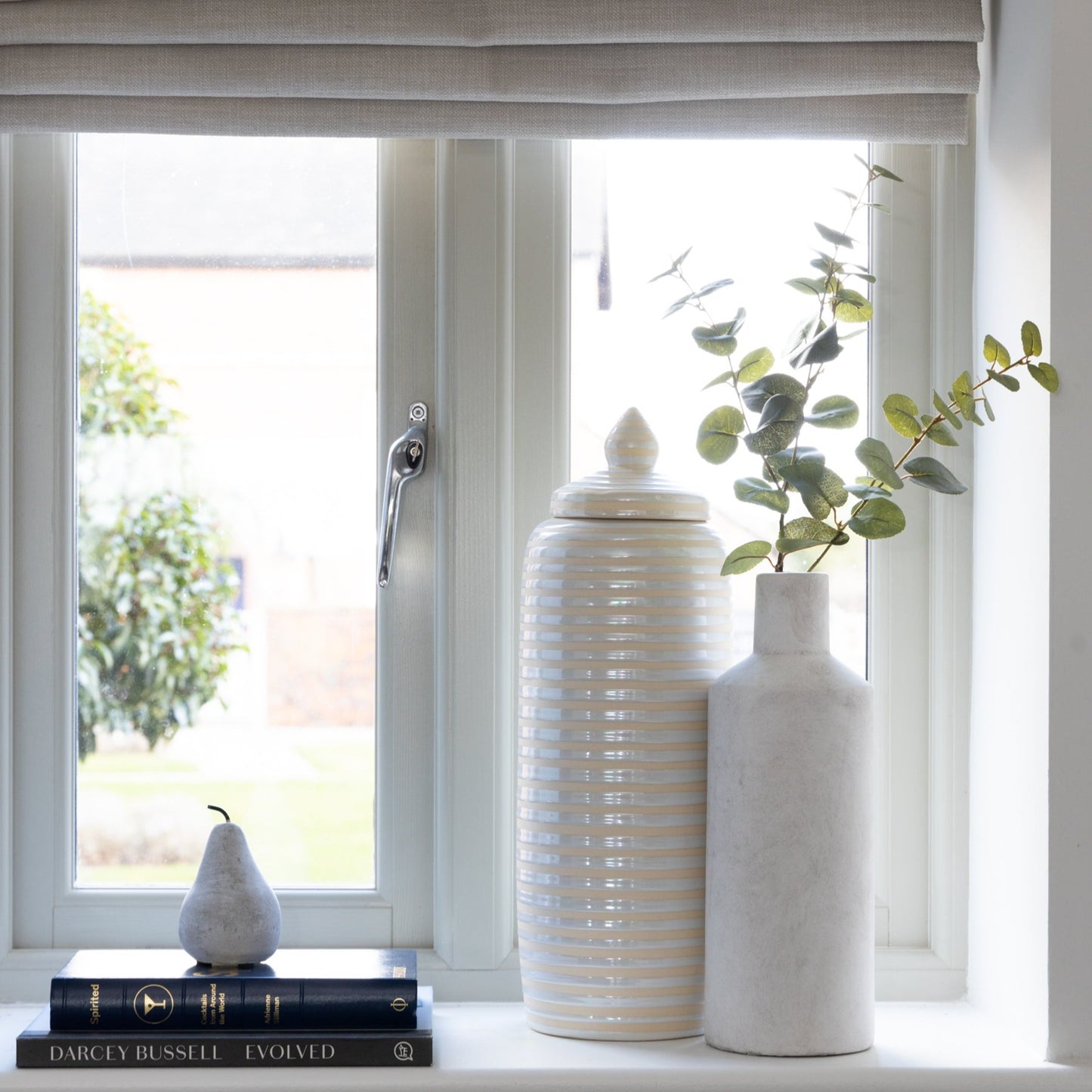 Lifelike Eucalyptus Stem with neutral and calming tones, available at Clarkson Lee Lifestyle.
