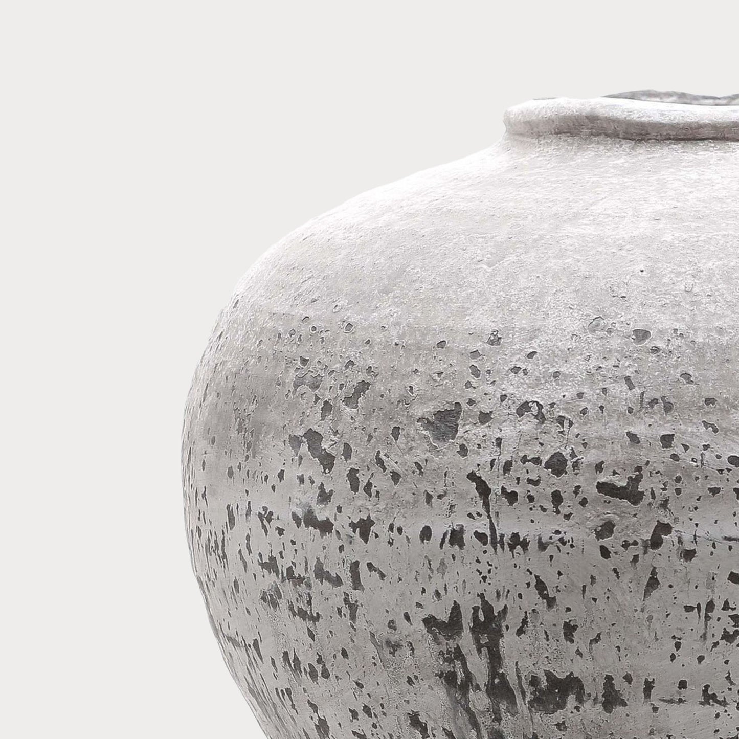 Side view of the Stone Finished Vase highlighting its elegant shape and finish.