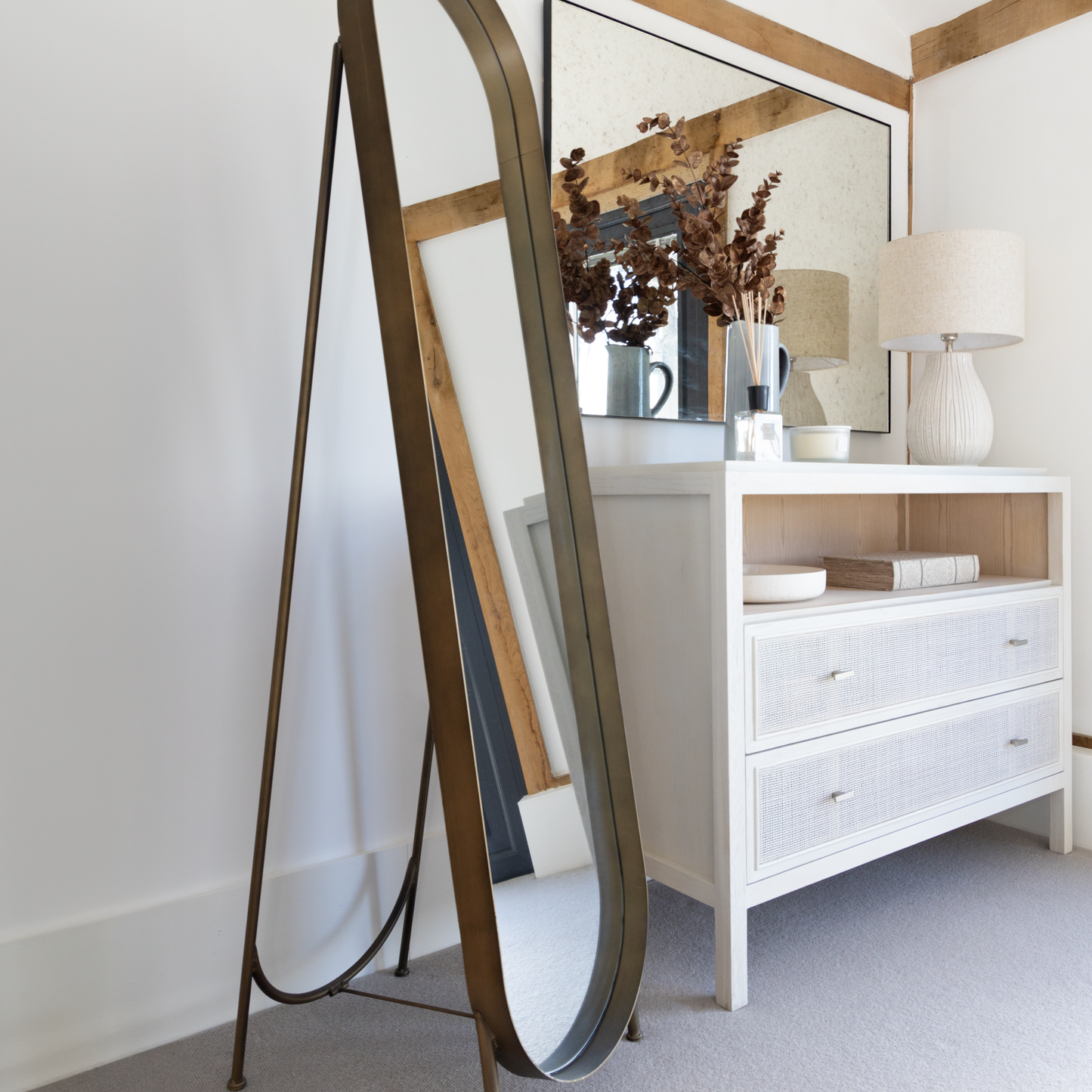 Close-up of Cheval Dress Mirror showcasing its rounded oblong design.