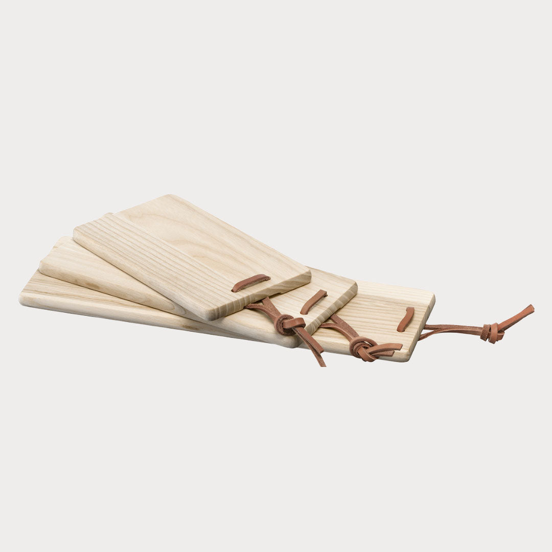 Set of 3 Wooden Serving Boards stacked, showcasing varying sizes.