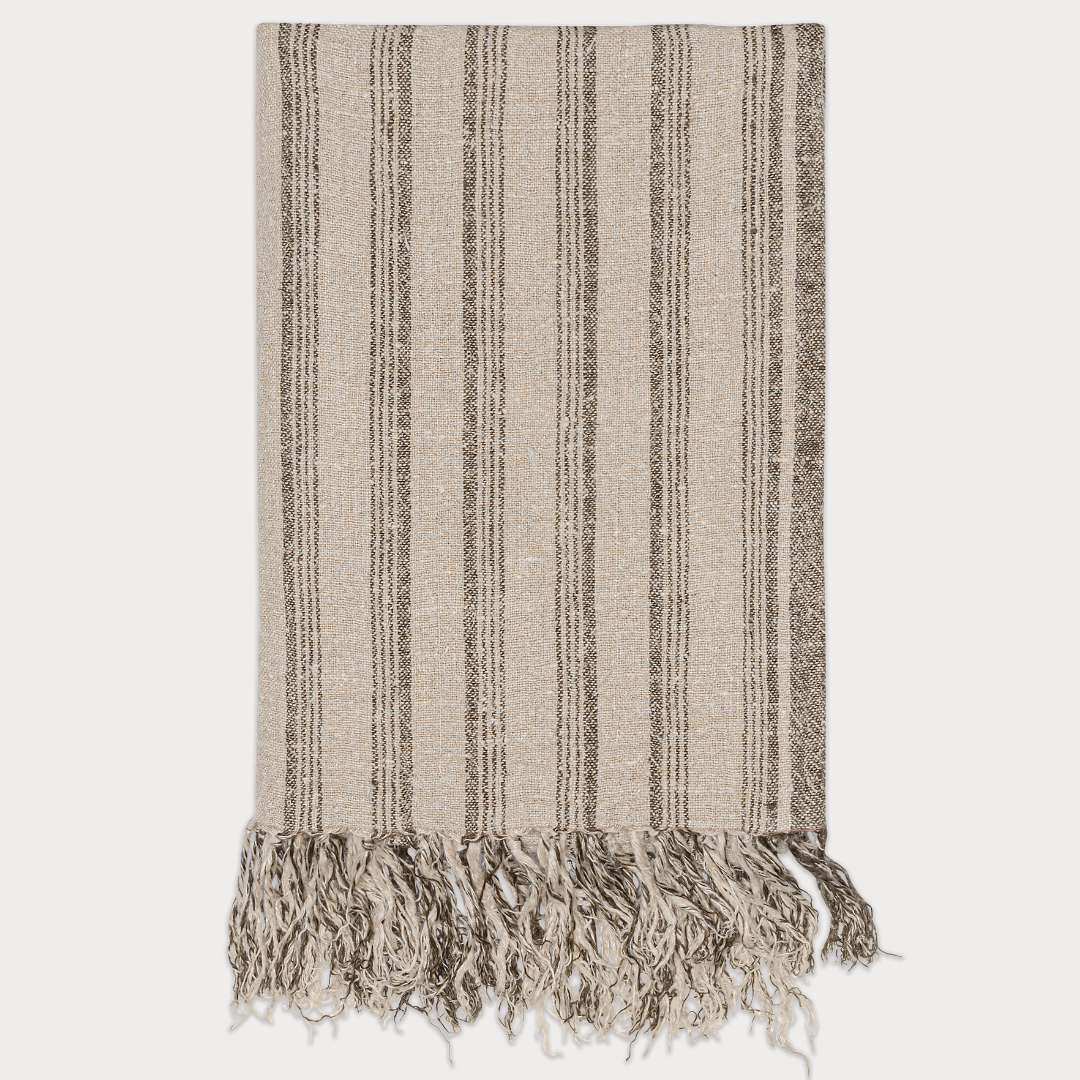 Close-up of the Striped Linen Throw showcasing its handwoven texture and neutral color palette.
