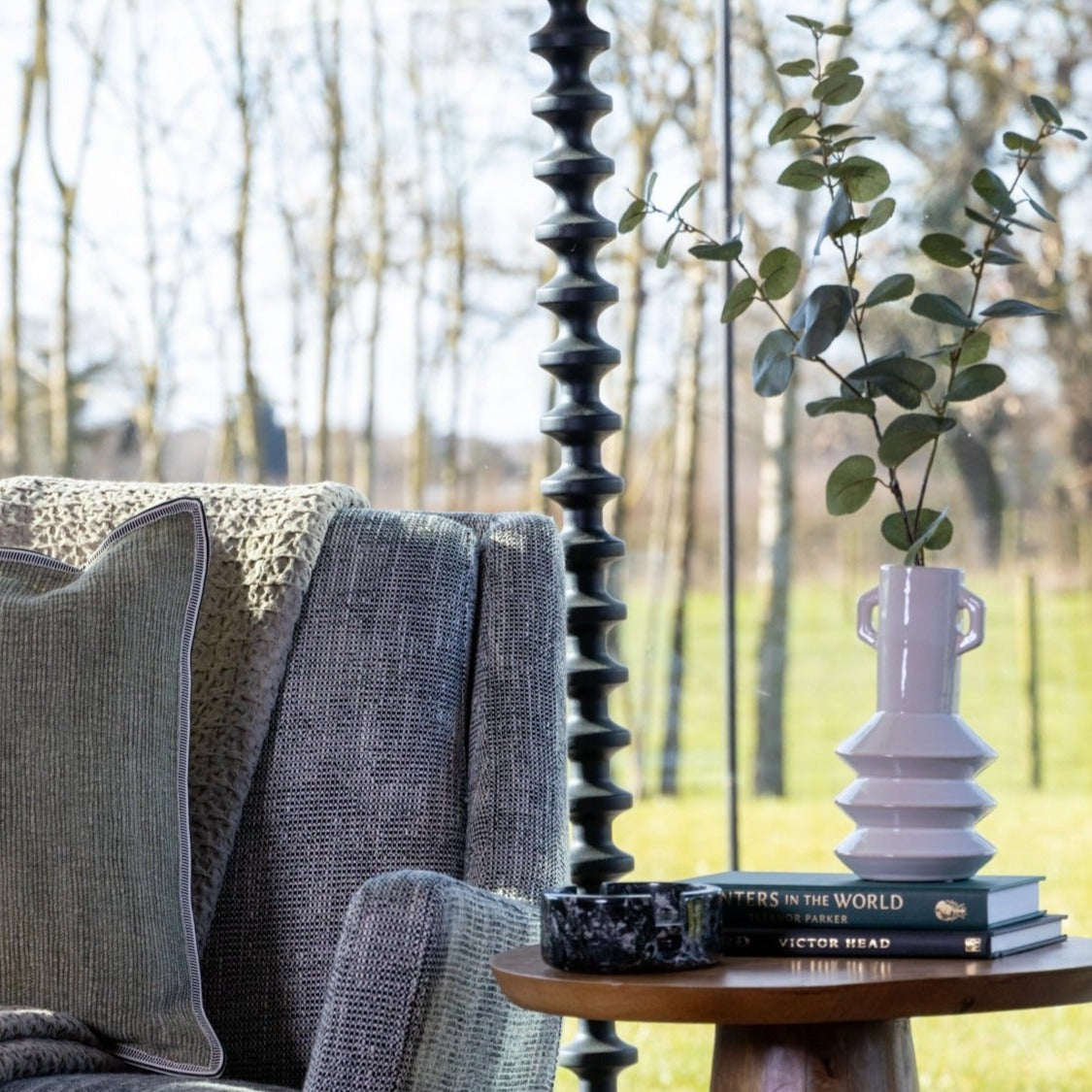 White Abstract Vase styled alongside other decorative items, creating a cohesive aesthetic.