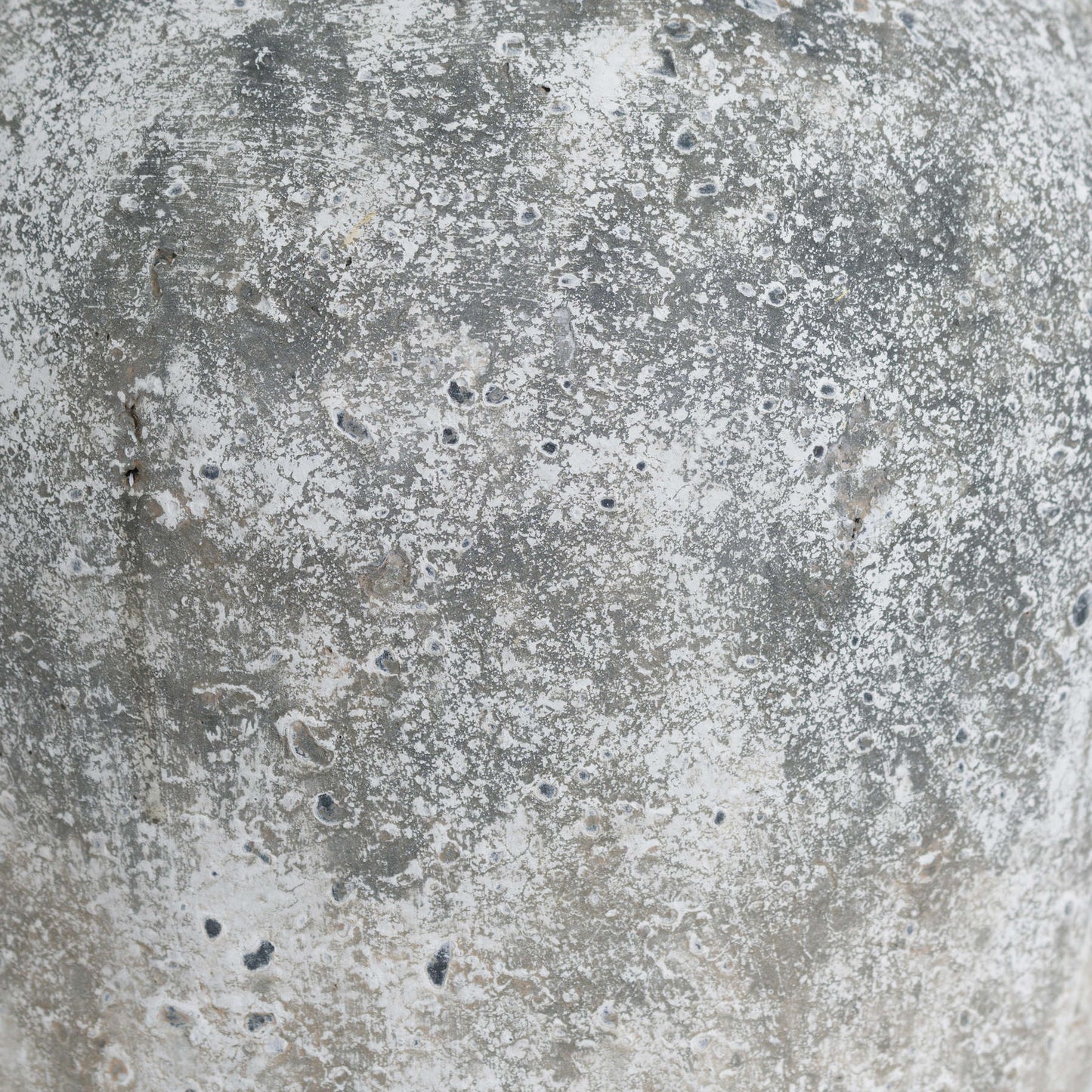 Close-up of the Aged Stone Vase showcasing its weathered ceramic texture.