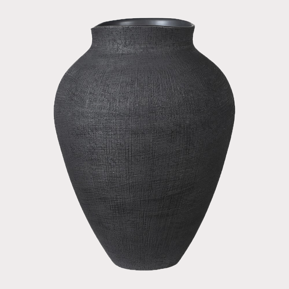 Close-up of the Black Textured Vase showcasing its intricate textured surface.