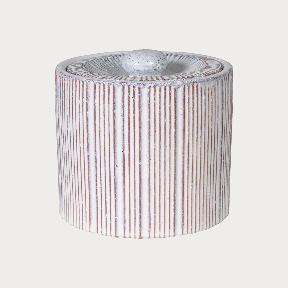 Side profile of Small Striped Lidded Jar highlighting its compact design and lid.