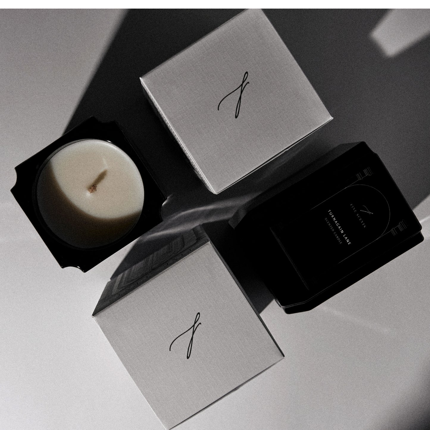Top view of Turnagain Lane Luxury Scented Candle highlighting the pristine wax and subtle design.