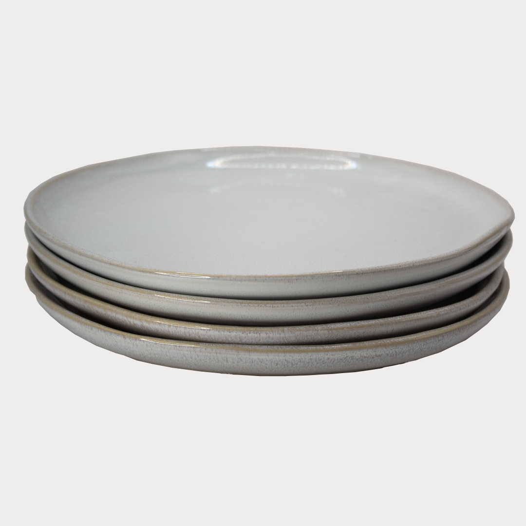 side profile of organic shaped plates showcasing their sleek design