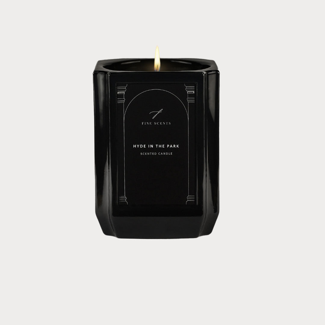 Close-up of Hyde in the Park Luxury Scented Candle's smooth wax surface in a stylish glass container.