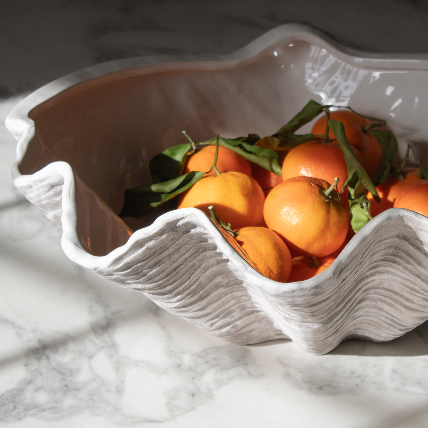 Seashell Inspired Bowl displayed on a coastal-themed dining table.