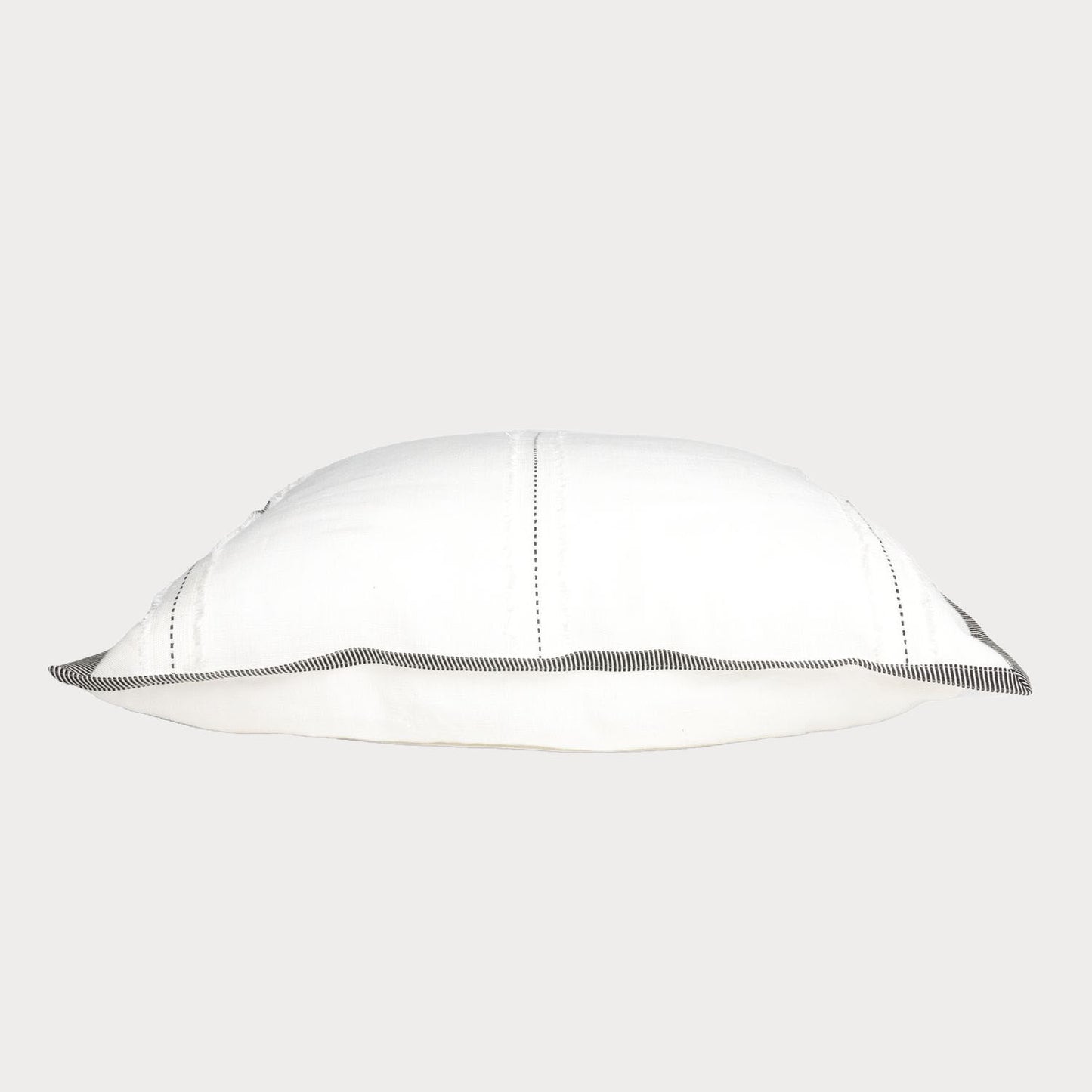 Side view of the cushion highlighting the detailed embroidery and quality craftsmanship.