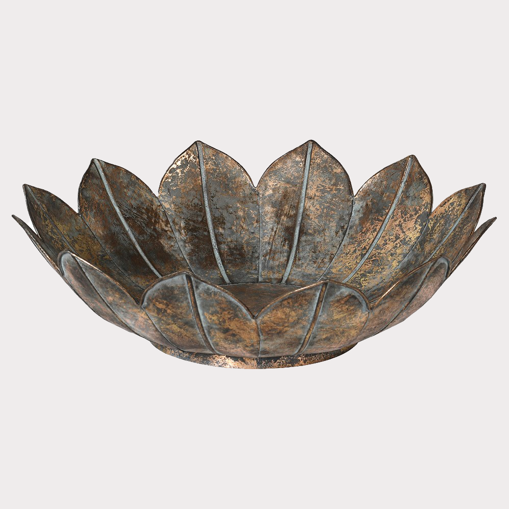 Close-up of Metal Lotus Bowl showcasing intricate petal design and iron texture.