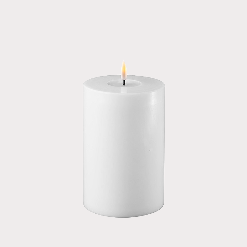 Close-up of the realistic flame effect on the Wide White Indoor LED Candle.