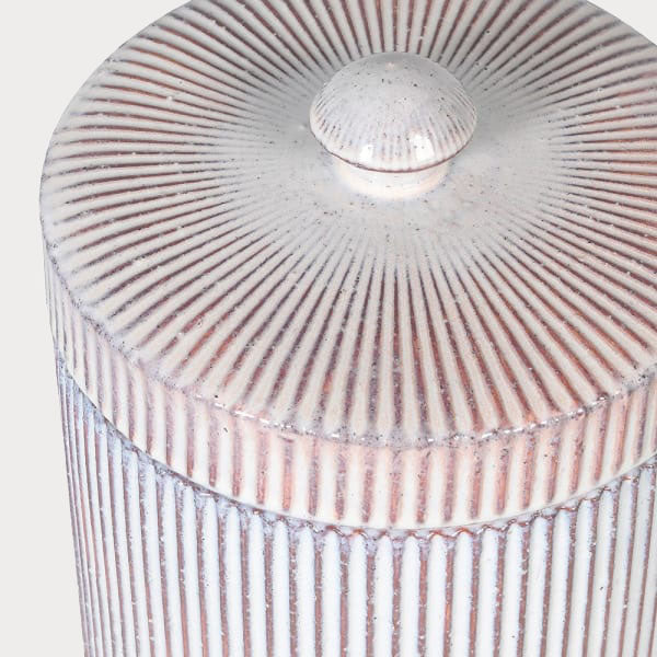 Side profile of Striped Lidded Jar highlighting its sleek cylindrical shape.
