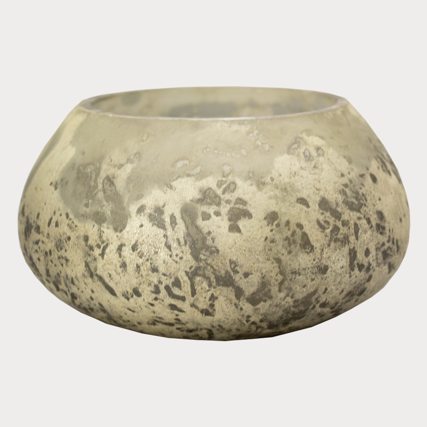 Soy wax candle with smoky quartz crystals lit, creating a warm glow.
