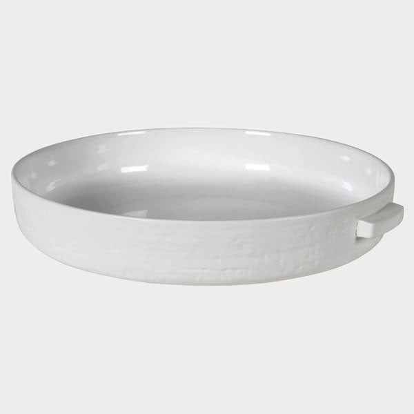 Close-up of Wide Display Bowl showcasing its smooth white finish and elegant design.