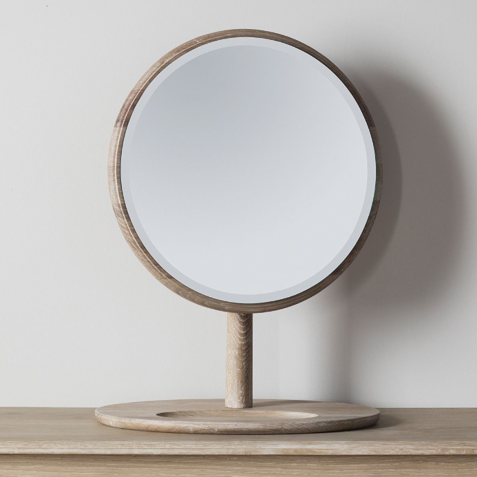 Oak Dressing Mirror positioned in a contemporary bedroom setting.