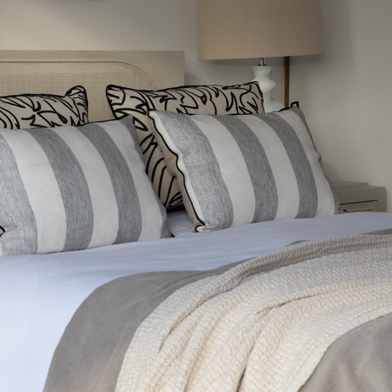Textured Velvet Throw used as a bedspread, enhancing the bedroom's opulent ambiance.