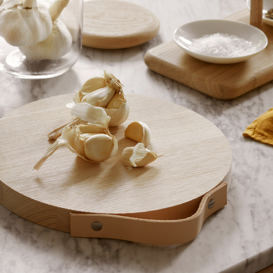 Wooden Board with Leather Handle made from sustainably-sourced ash wood, available at Clarkson Lee Lifestyle.