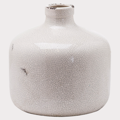 close up of the small crackled vase showcasing its shape and intricate design