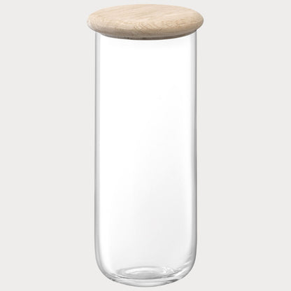 side profile of the tall glass container showcasing its sleek design