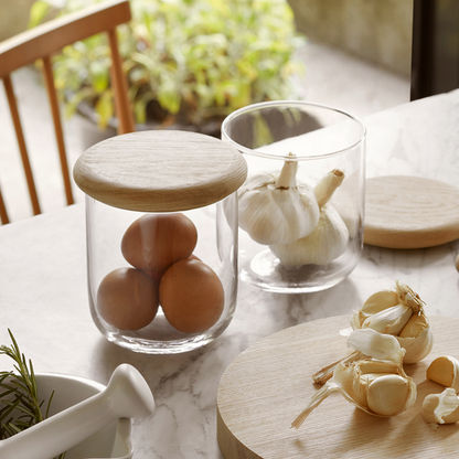 Close-up of Glass & Oak Storage Container highlighting the natural oak lid.