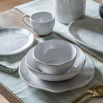 Close-up of Organic Ridged Dinner Plate showcasing its elegant design.