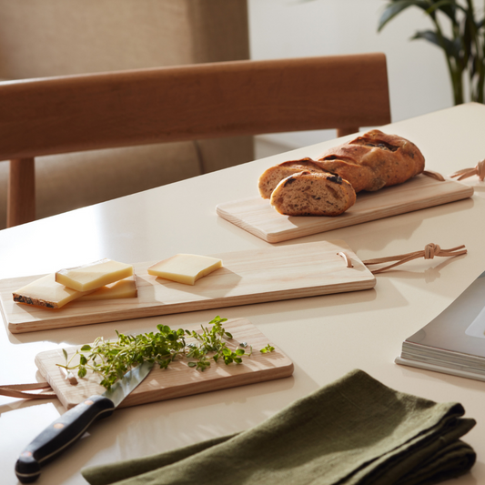 Set of 3 Wooden Serving Boards with leather handles, showcasing rustic and contemporary design, available at Clarkson Lee Lifestyle.
