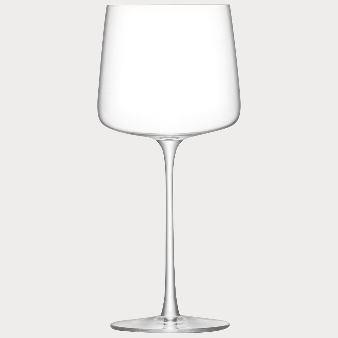 Small wine glass from the set, ideal for intimate wine tasting sessions.