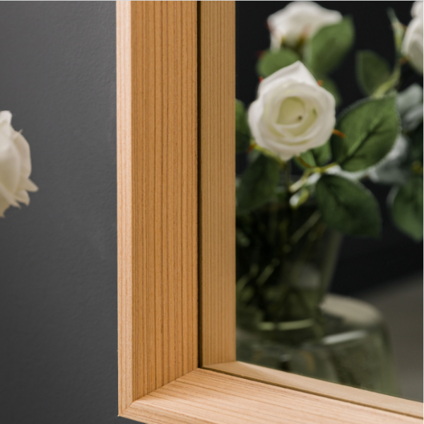 Side profile of Oak Wall Mirror highlighting its sleek and sturdy frame design.