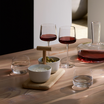 Close-up of hand-blown wine glass showcasing its elegant curved silhouette.
