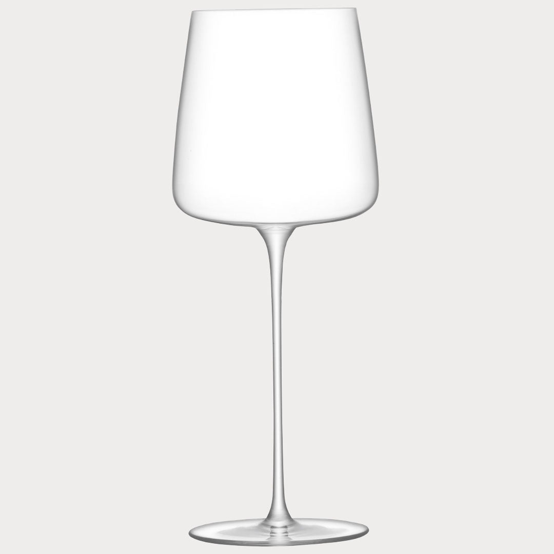 Side view of large wine glass highlighting its tall stem and spacious bowl.
