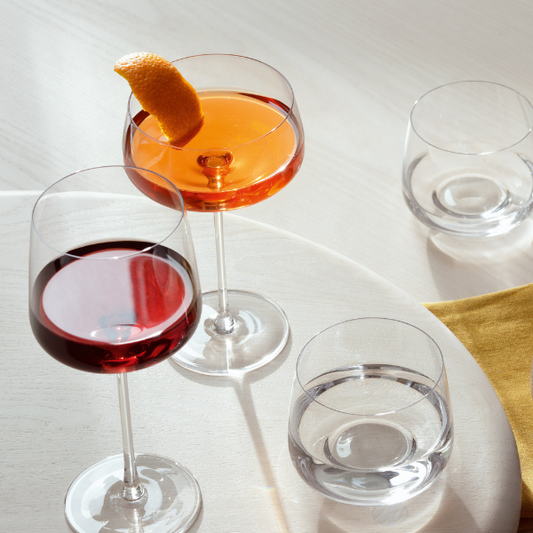 Set of 4 vintage-style champagne saucers, perfect for cocktails and special occasions.