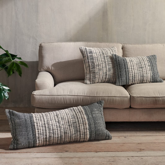 Recycled Black & Neutral Cushion made from eco-friendly recycled plastic yarn, available at Clarkson Lee Lifestyle.