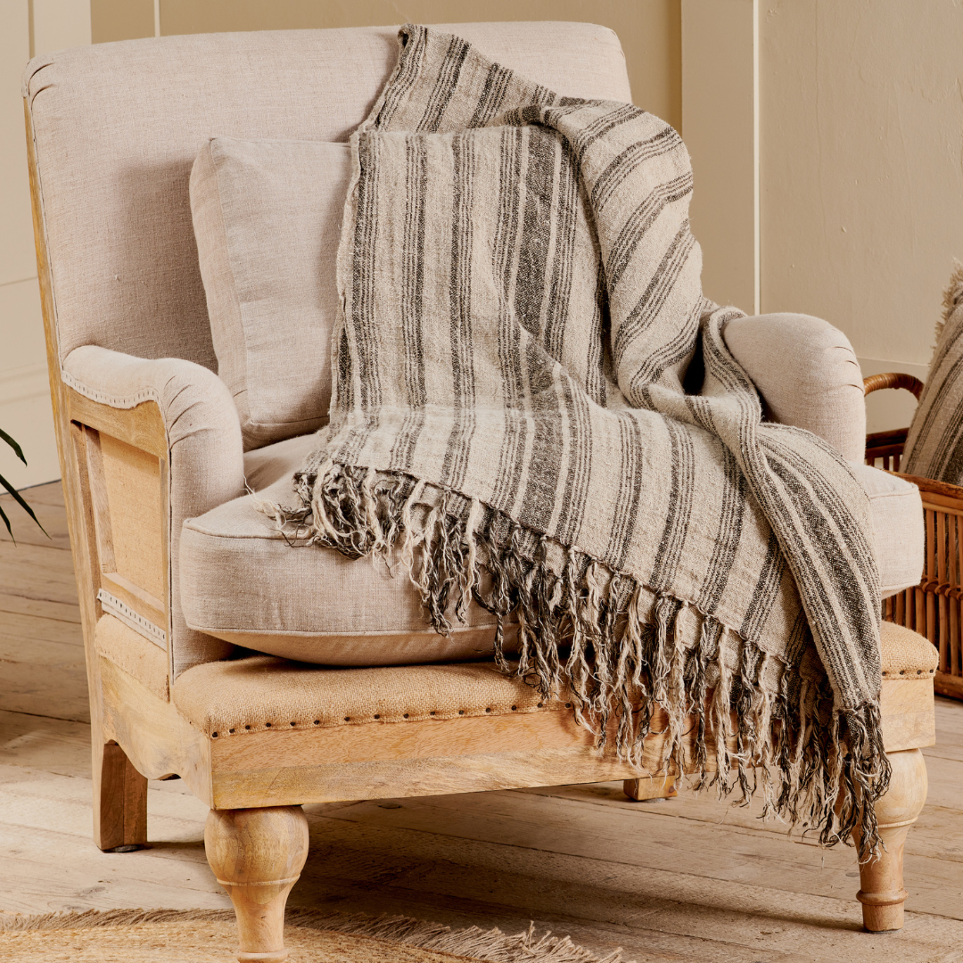 Handwoven Striped Linen Throw in neutral tones, available at Clarkson Lee Lifestyle.