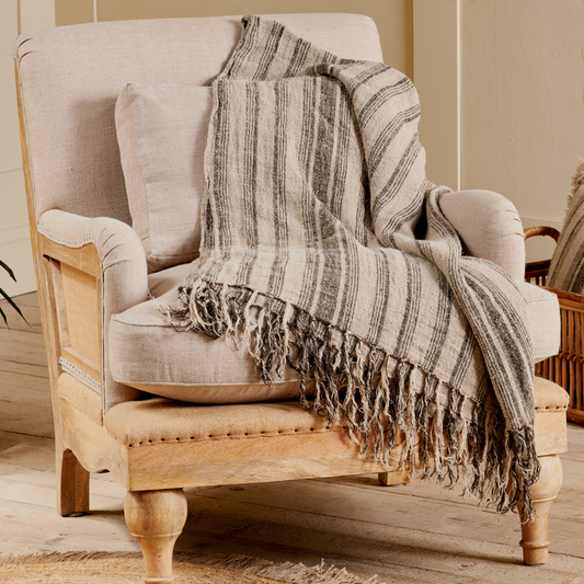 Handwoven Striped Linen Throw in neutral tones, available at Clarkson Lee Lifestyle.