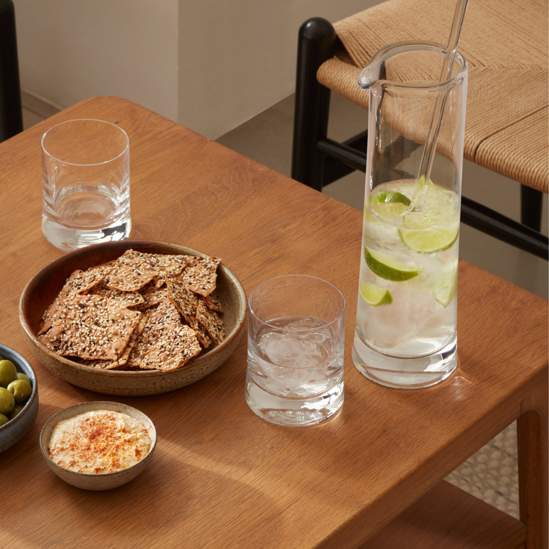 "Cocktail jug and glass stirrer set displayed on a table, ready for entertaining.
