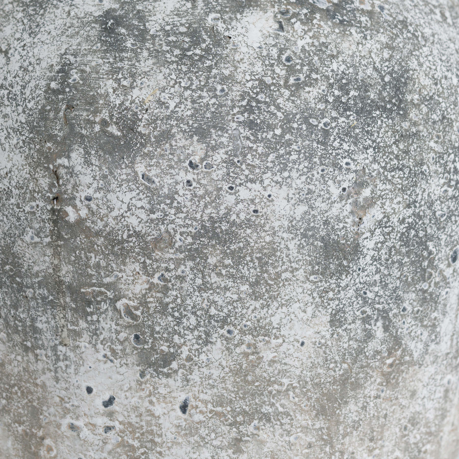 Close-up of the Aged Stone Vase showcasing its weathered ceramic texture.