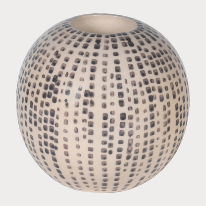 Close-up of Hand Painted Tealight Holder showcasing intricate artistic patterns.
