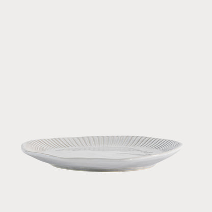 Set of Organic Ridged Side Plates neatly stacked, highlighting their uniform craftsmanship.