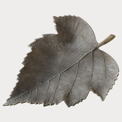 Close-up of Grey Leaf Bowl showcasing its detailed leaf pattern and weathered texture.