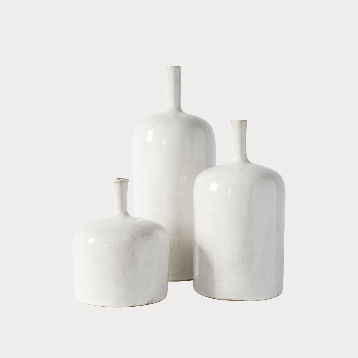 Set of 3 Scandi Style Vases displayed together, illustrating varying sizes and the white tones."

