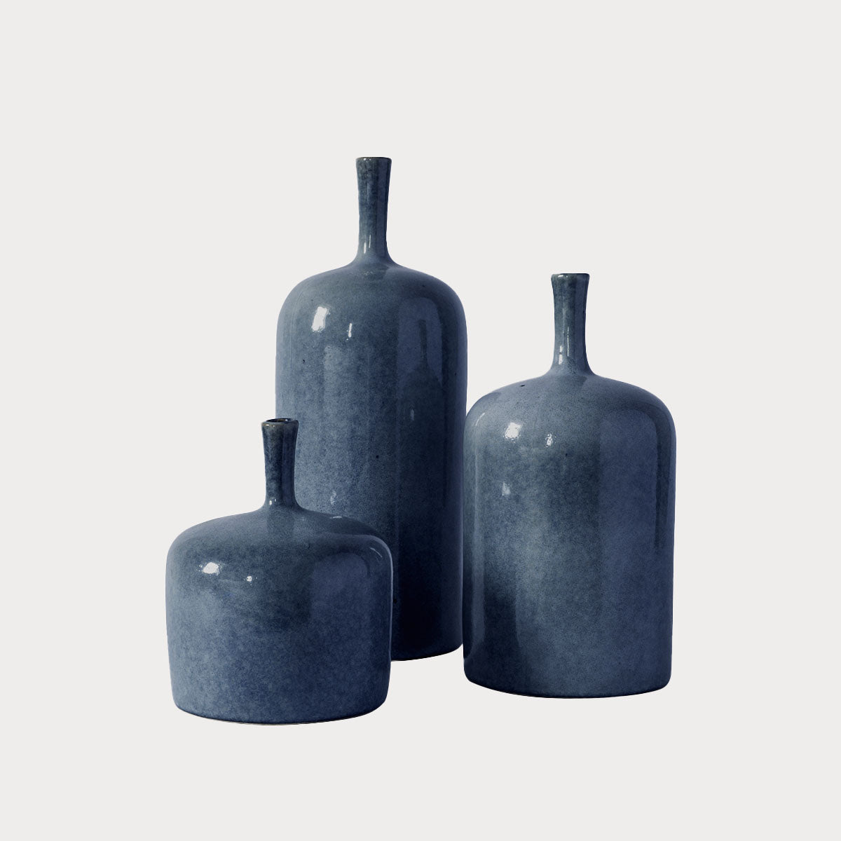 Set of 3 Scandinavian-style vases in varying sizes and neutral tones, available at Clarkson Lee Lifestyle