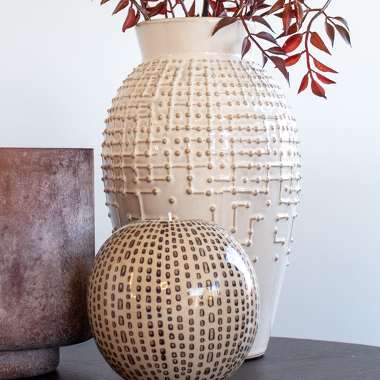 Textured Dotty Vase with tactile dot pattern and neutral finish, available at Clarkson Lee Lifestyle.