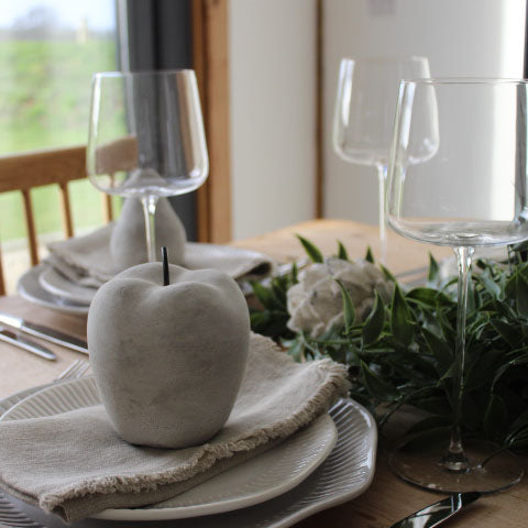 Set of 4 hand-blown wine glasses with elegant curved design, available at Clarkson Lee Lifestyle.
