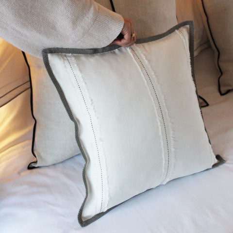 Embroidered Linen Cushion with intricate embroidery, available at Clarkson Lee Lifestyle.