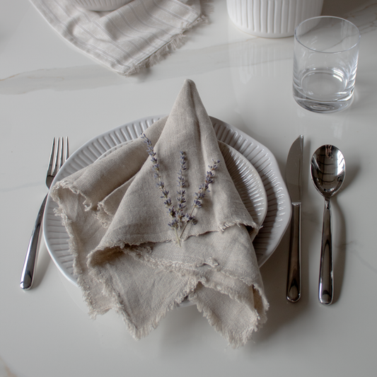 Set of 6 Linen Napkins in classic design, available at Clarkson Lee Lifestyle.