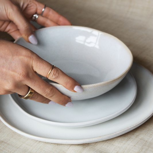 Organic Shaped Crockery Set featuring dinner plates, side plates, and bowls, available at Clarkson Lee Lifestyle.