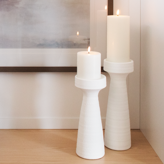 Indoor & Outdoor LED Candle emitting warm glow, flameless pillar candle by Clarkson Lee Lifestyle.