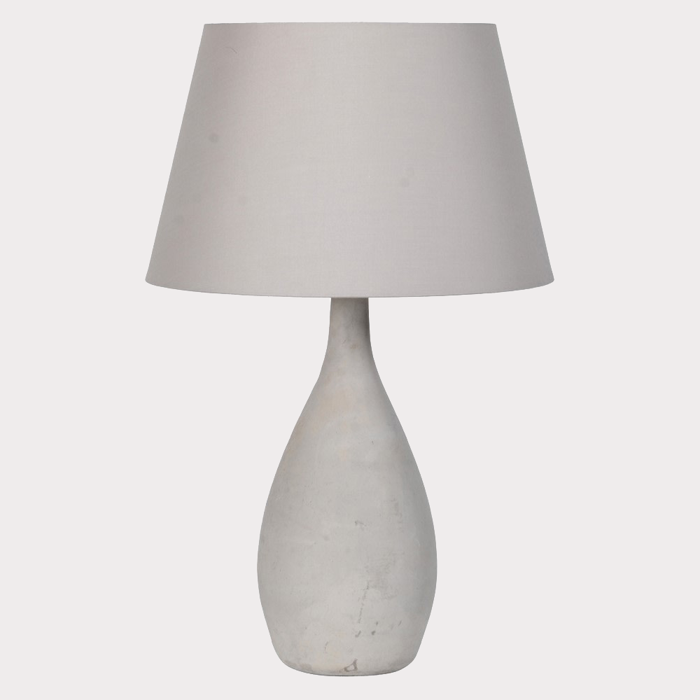 Close-up of the Concrete Lamp's base showcasing its industrial-inspired texture.
